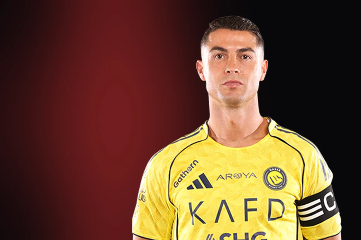 Cristiano Ronaldo i landslagskläder mot en mörk bakgrund med röd ljusaccent